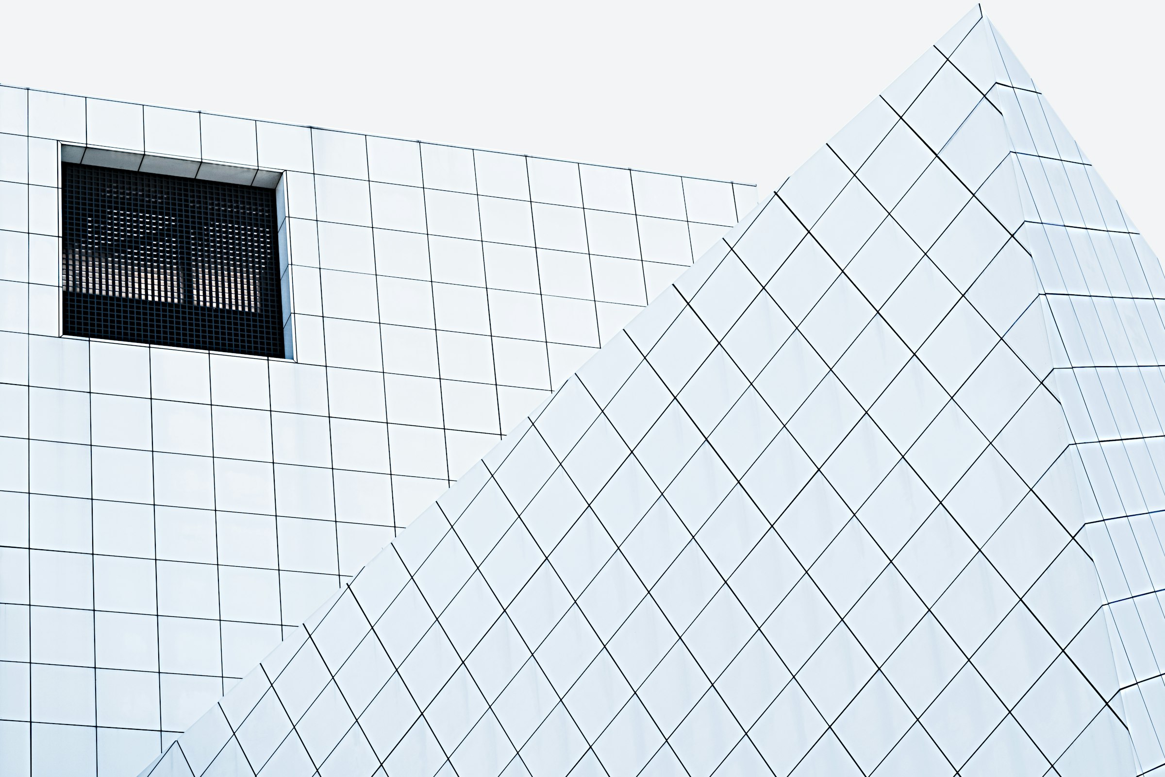 A building's architectural geometry, lines and grid in black and white.