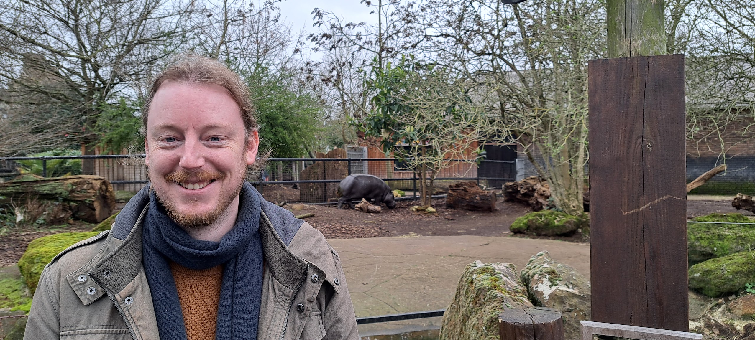 Jamie from Neuro Support, smiling outdoors